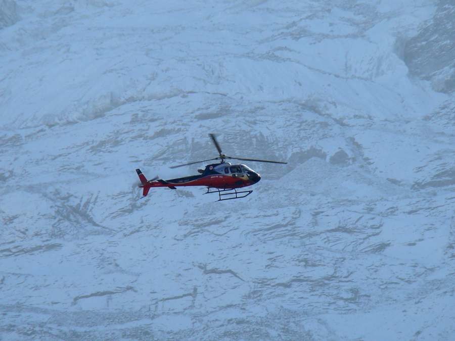 A Helicopter flying to the Everest on a Tour